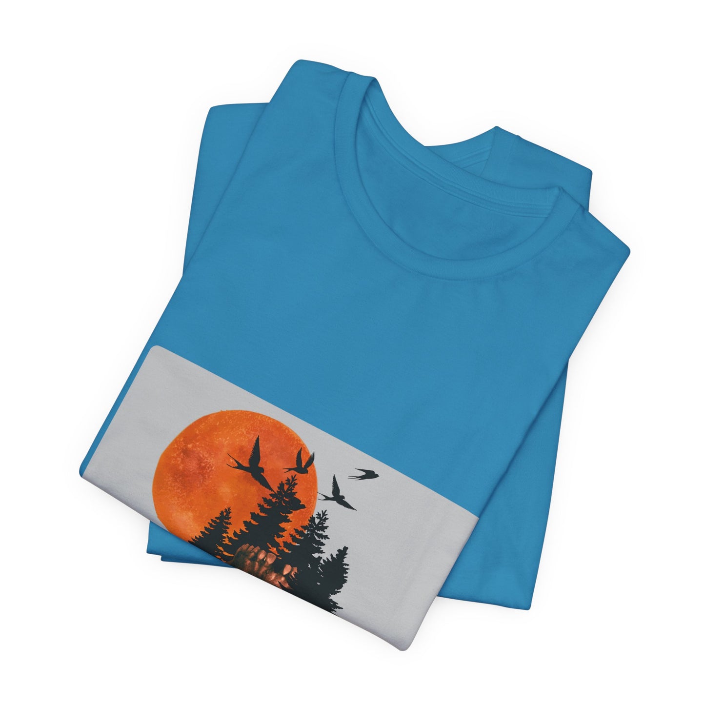 Blue t-shirt with nature-themed graphic on a white background