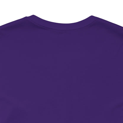 Close-up of a purple shirt with a plain background