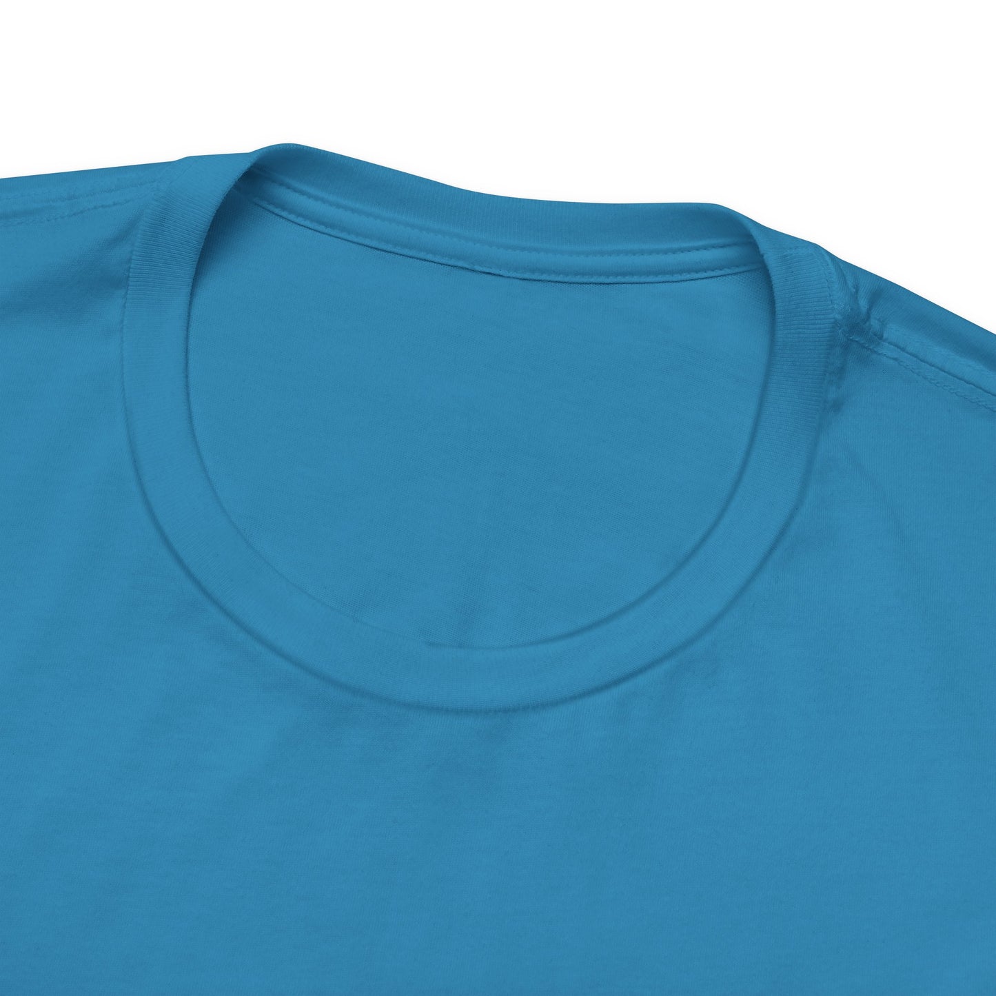 Close-up of a blue t-shirt with a plain background