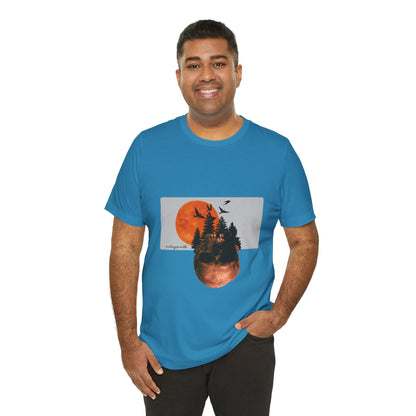 Man wearing a blue t-shirt with a nature graphic design on a white background